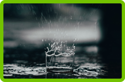 Photo of rain water hitting the ground